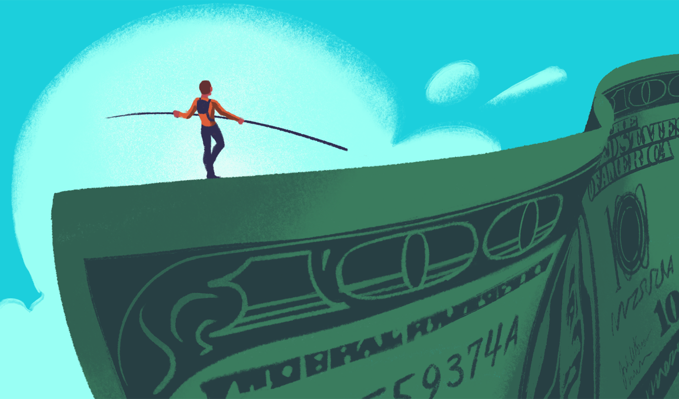 A person triumphantly balances atop a large dollar bill, symbolizing success and financial achievement.