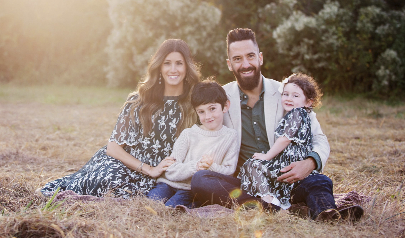 Outdoor photo of Jules Bosi, her husband and children