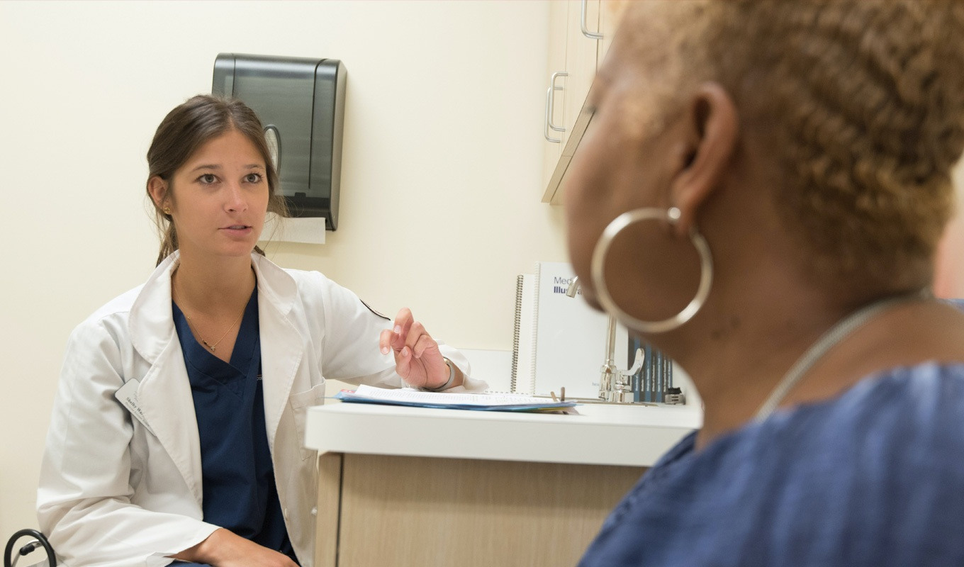 Doctor consulting her patient