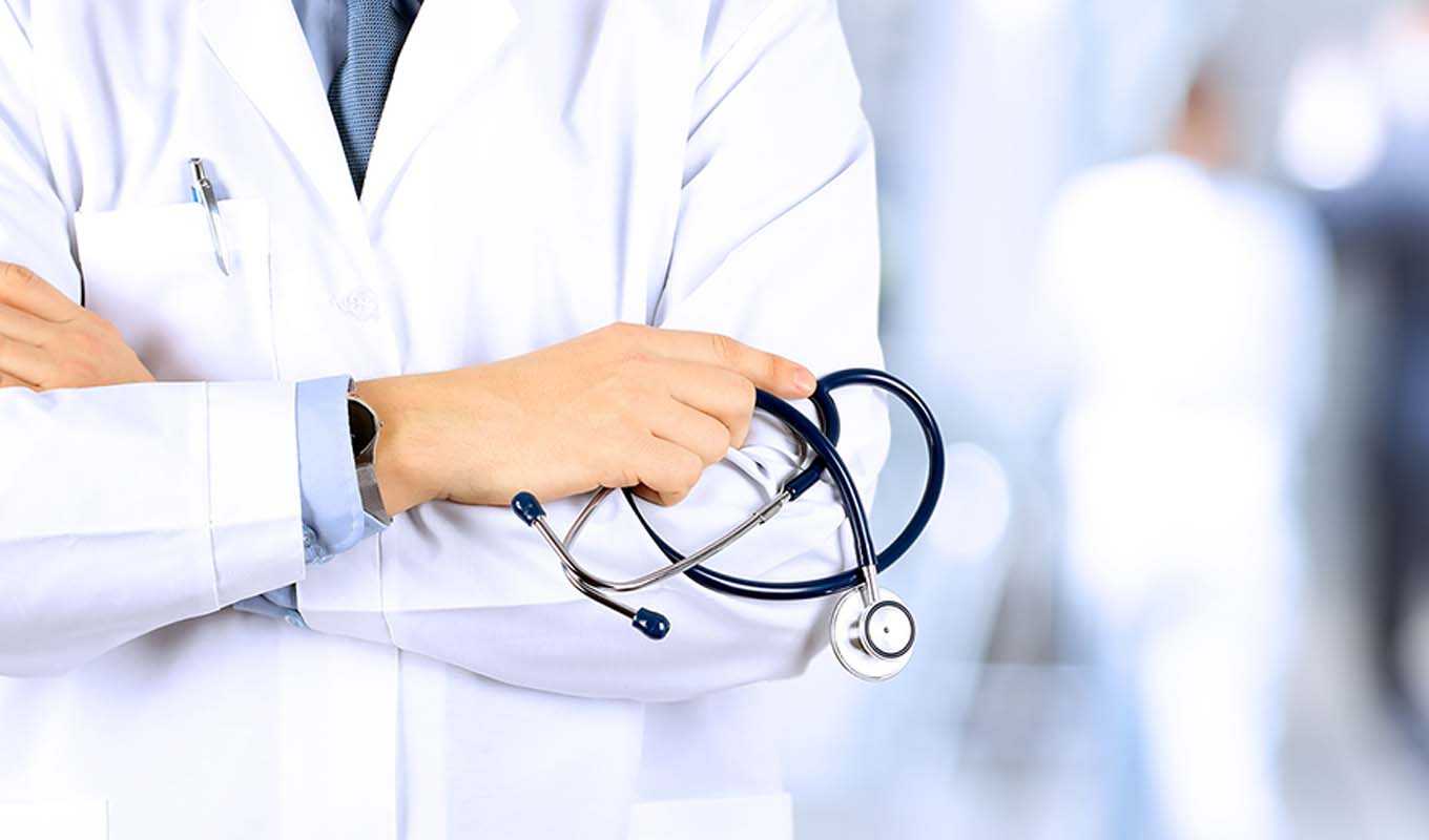 Doctor holding stethoscope