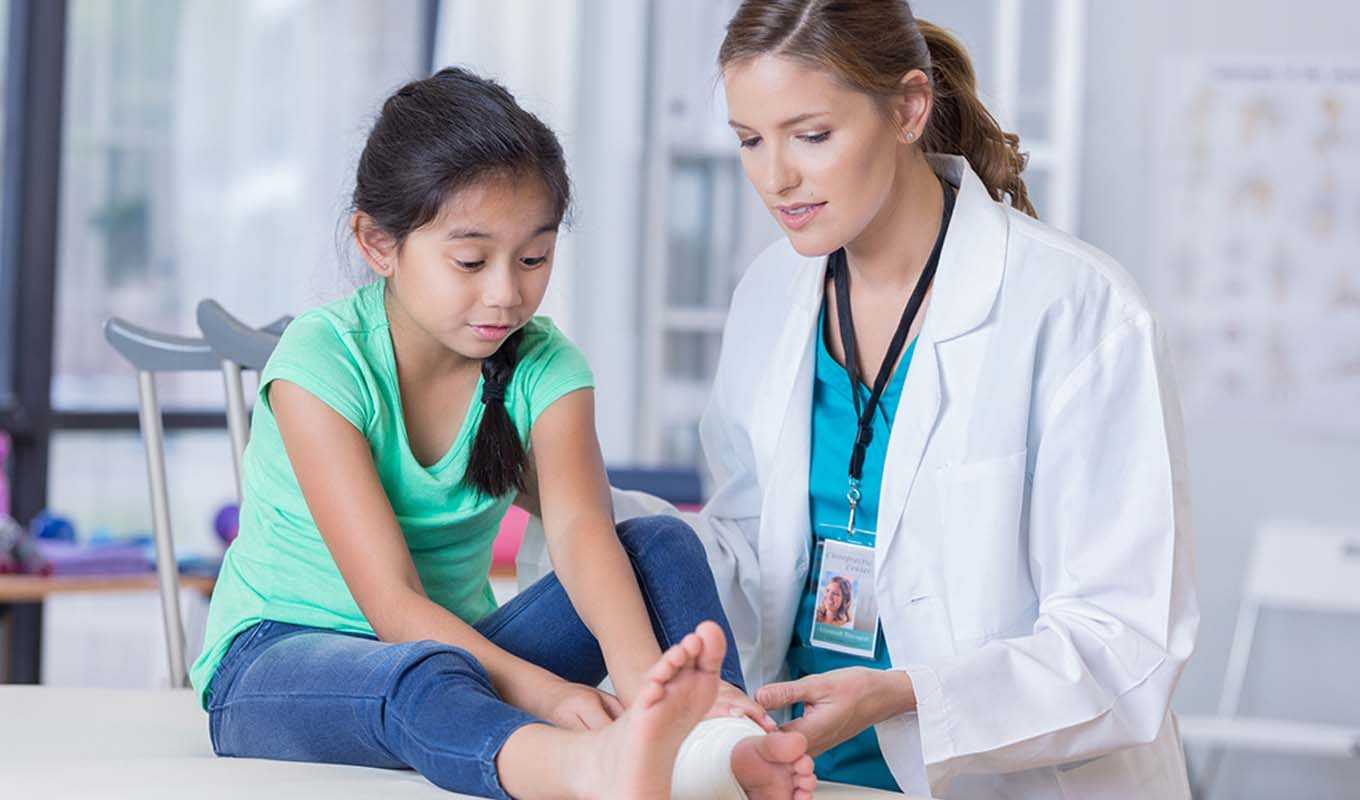 Doctor with a young patient