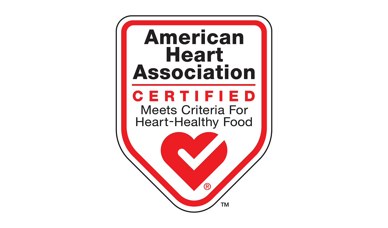 Logo of the American Heart Association, featuring a red and white shield with text, "Certified – Meets Criteria For Heart-Healthy Food" and a red heart symbol.