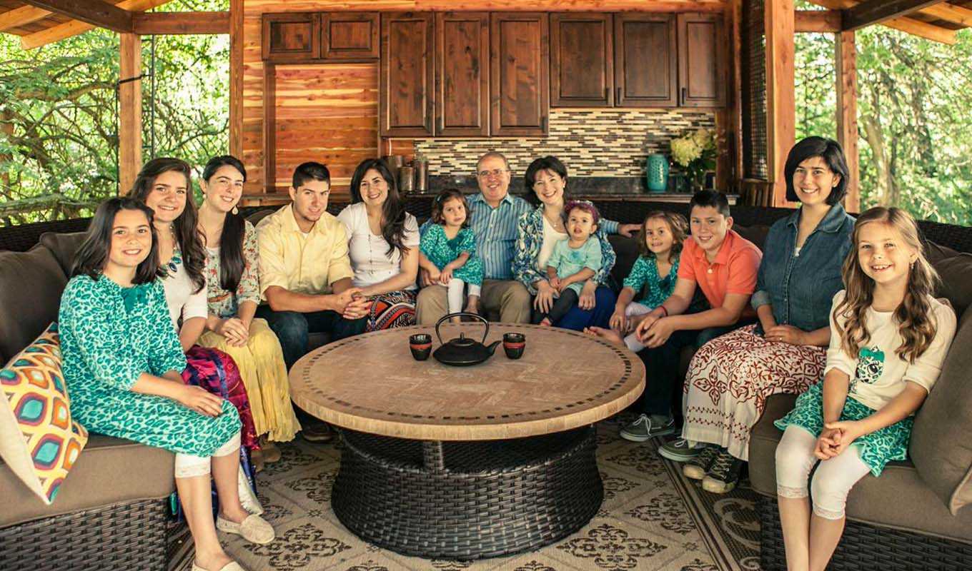 the Hogan family sitting around a living room together
