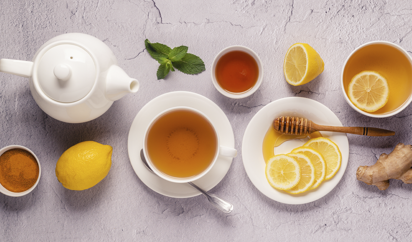 All the ingredients for honey tea laid out upon a table