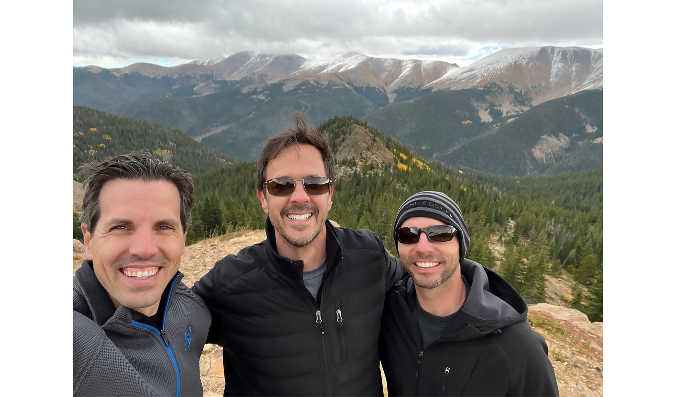 Anthony, center, connects with friends and fellow Samaritan Ministries staffers Rob Waldo and Michael Grimm for another special memory.