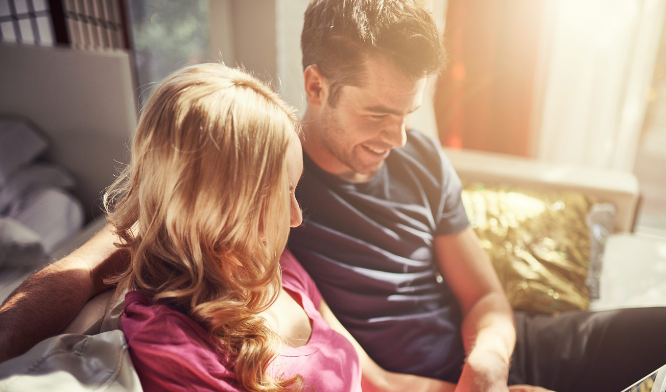 Husband and wife on a laptop