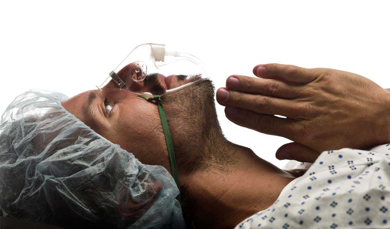 Patient, ready for surgery, praying