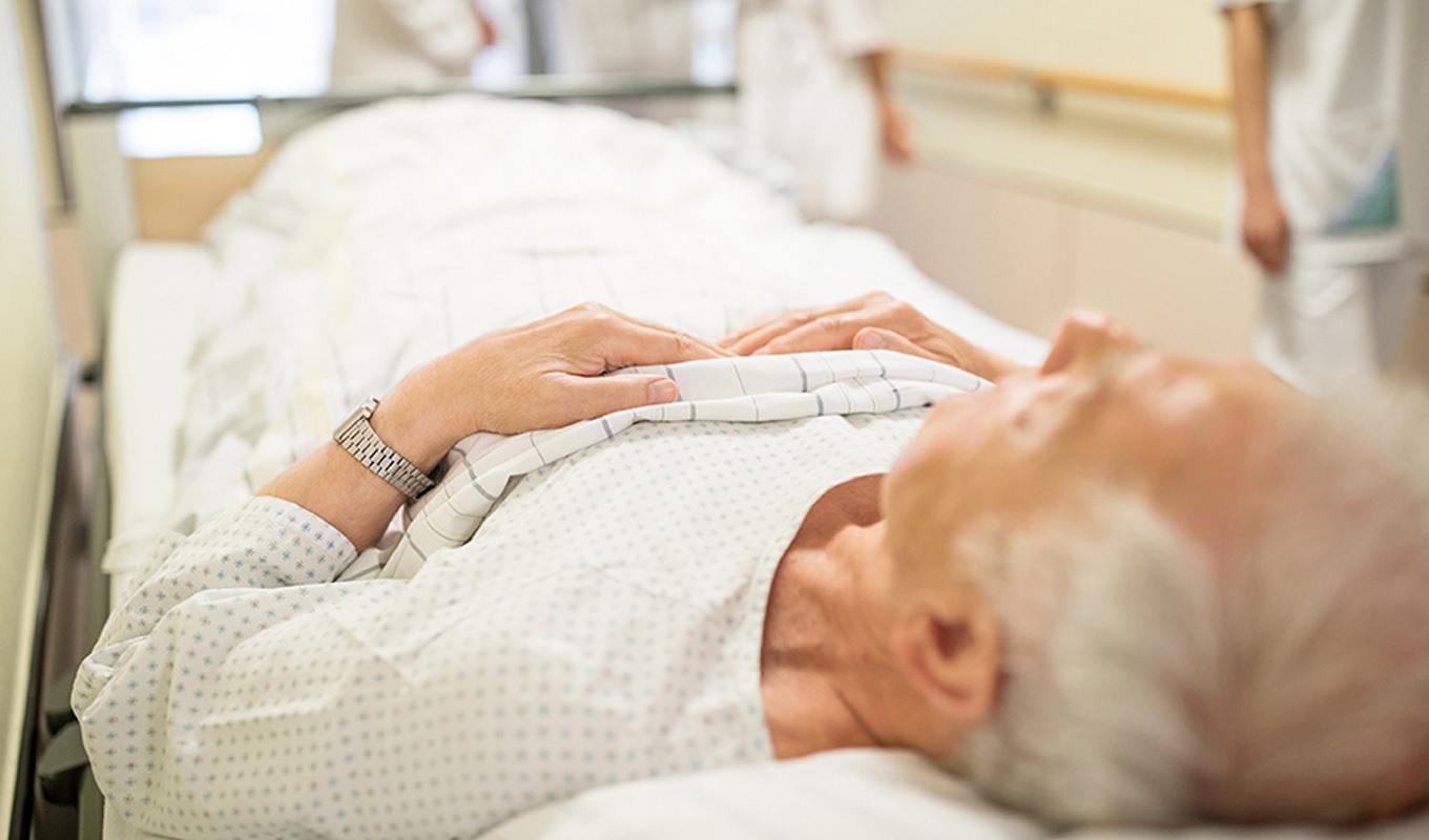 Elderly man on a gurney