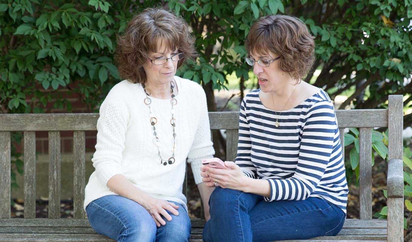 Samaritan ministries staffers talking on a bench outside our office