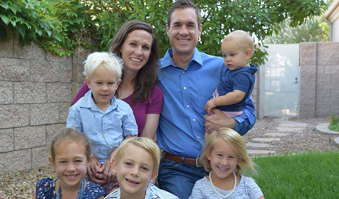 Gregg and Kelly Schmedes, and their young children