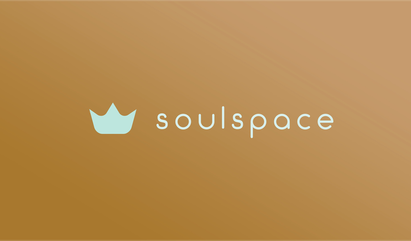 Light blue crown icon beside the word “soulspace” in a clean, minimalist font on a warm gradient orange background.