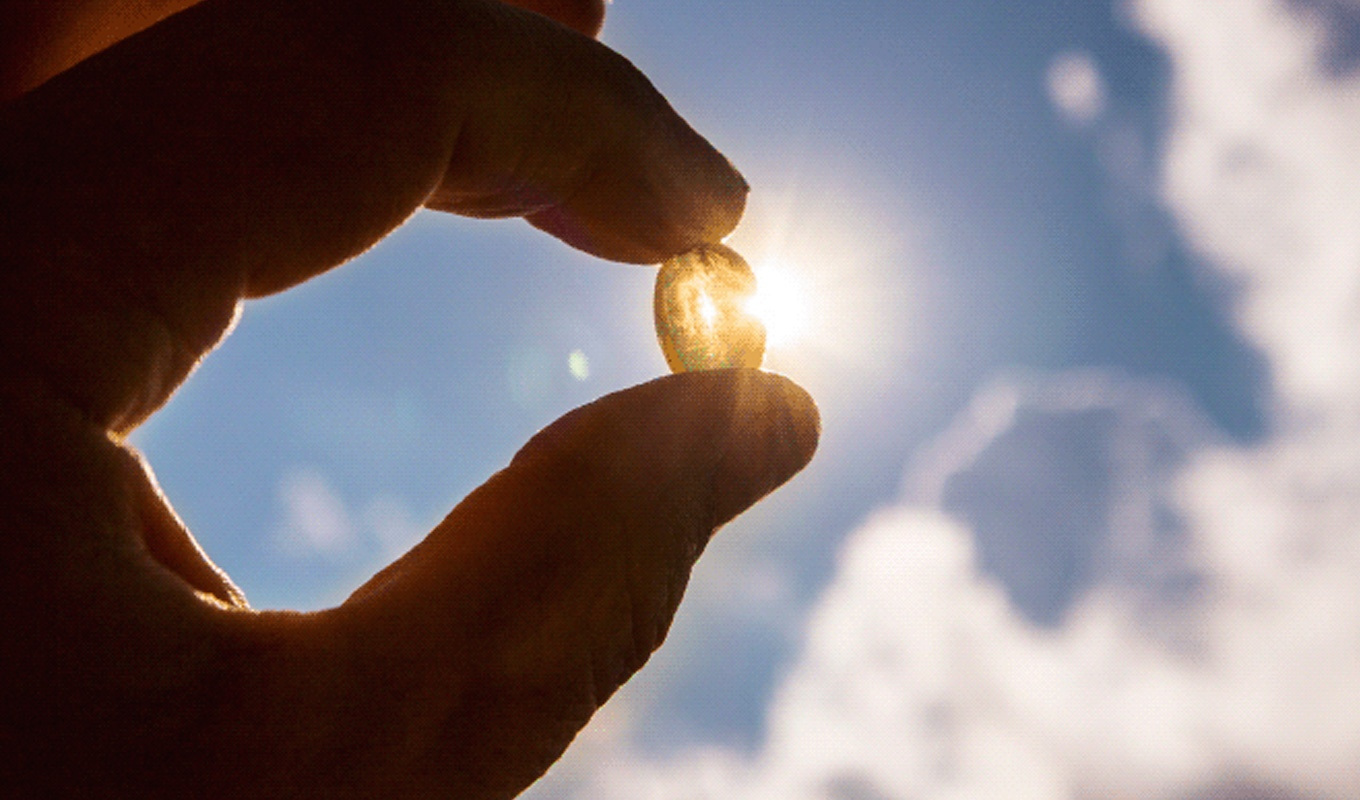 Holding a pill up to the sun