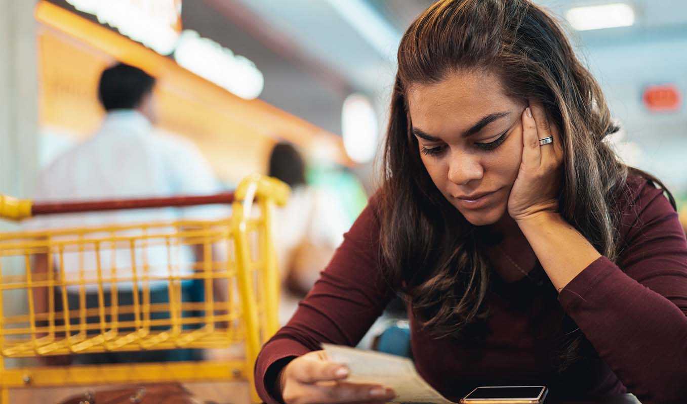 Woman struggling with bills